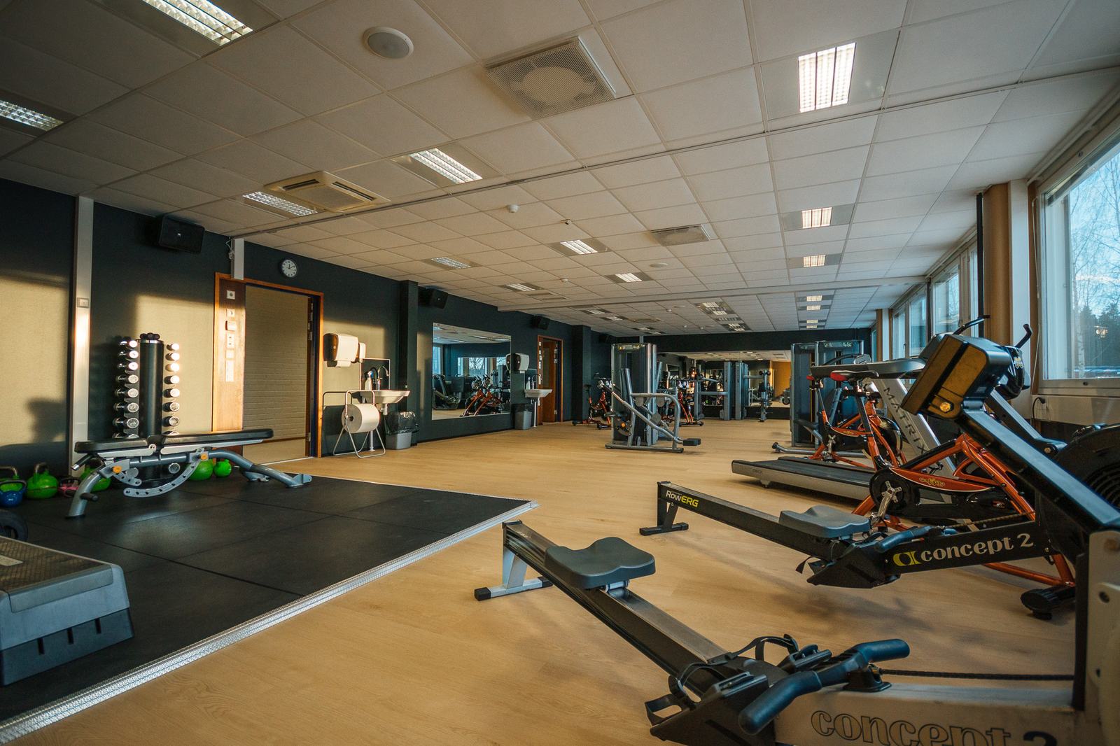 Functional training area with sleds, weights and open floor space