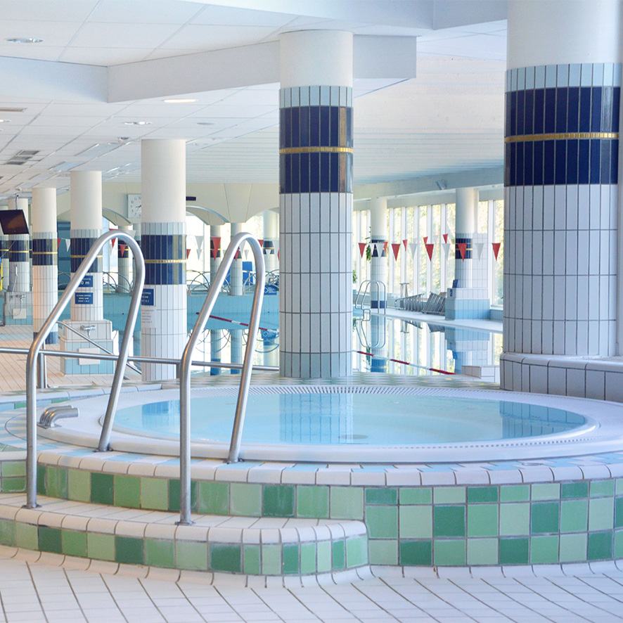 Indoor spa pool with tiled surroundings at Spa Hotel Kunnonpaikka